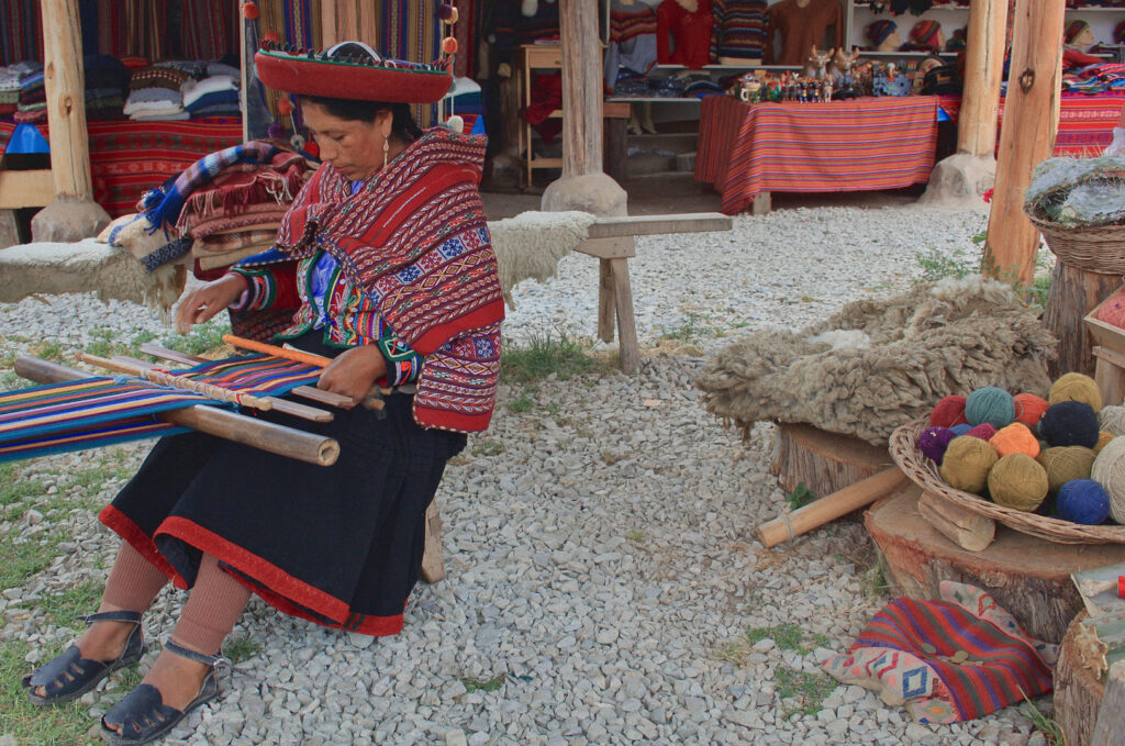 Sacred Valley - Woman weaving in Chinchero