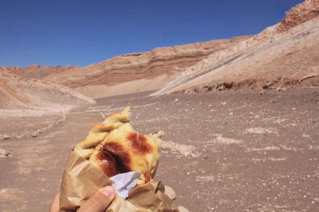 Best Chilean empanadas in San Pedro de Atacama before exploring Valle de la Luna by bike